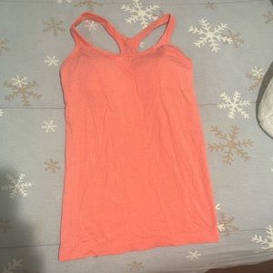 Lululemon ebb to street tank size 8 included with built in padding!!!